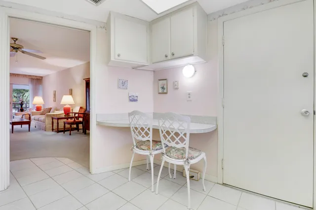 a view of a kitchen and dining area