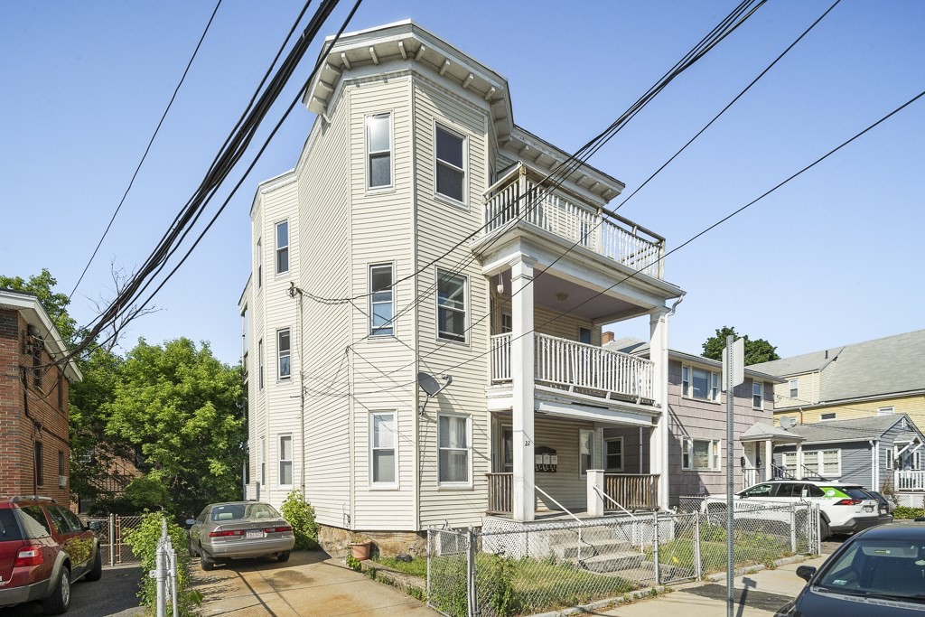 22 Gardena Street, Unit 3 Boston, MA 02135 - Photo 2 of 30 a front view of a residential apartment building with a yard