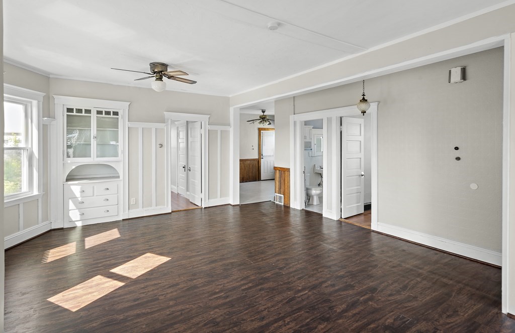 22 Gardena Street, Unit 3 Boston, MA 02135 - Photo 9 of 30 a view of an empty room with window and wooden floor