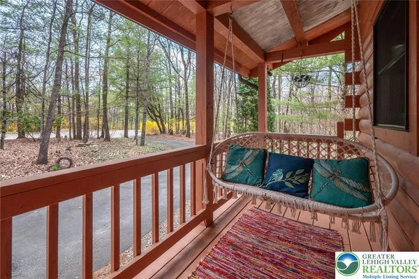 a view of balcony with furniture