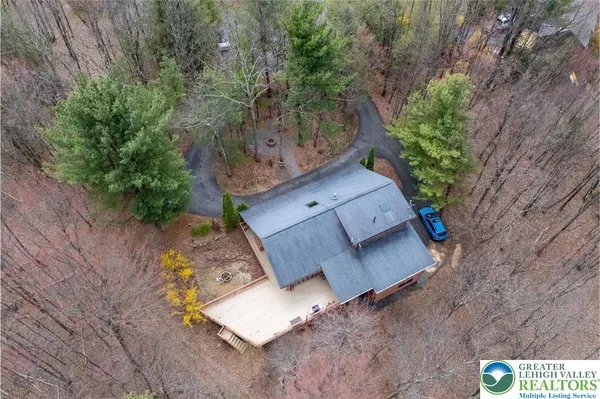 an aerial view of a house with garden