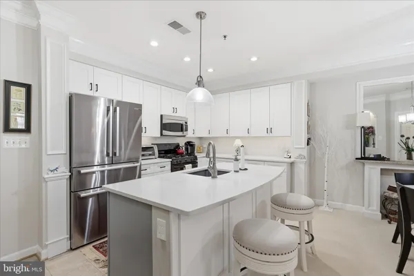 $595,000 | 10328 Sager Avenue, Unit 403, Fairfax, VA 22030
