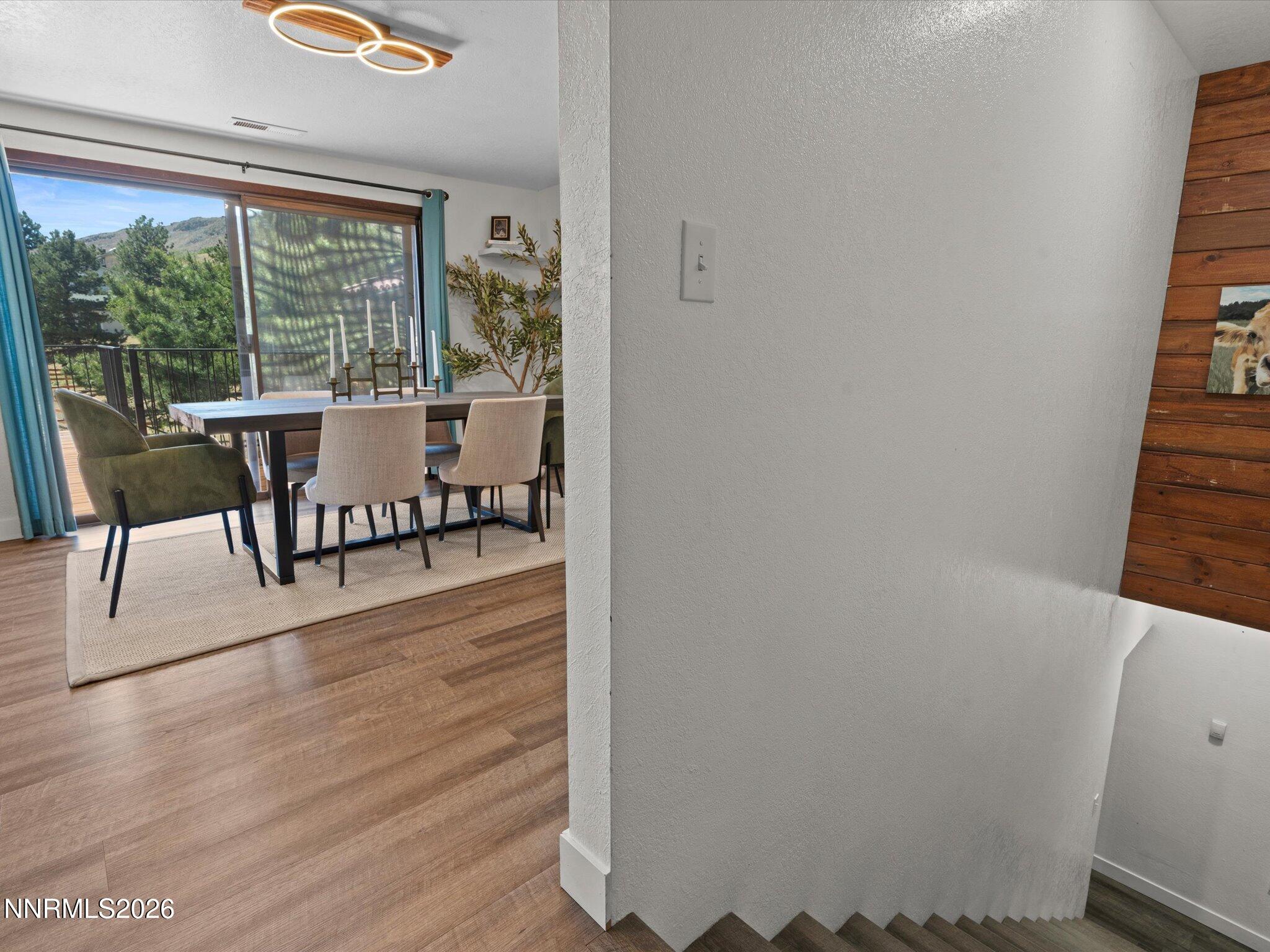 20449 Temelec Way Reno, NV 89521 - Photo 36 of 65 a view of a room with furniture and wooden floor