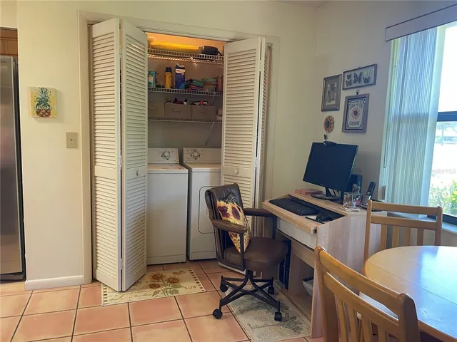 a workspace with furniture and lamp