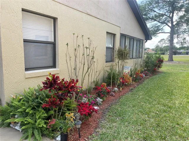 a view of a house with a garden