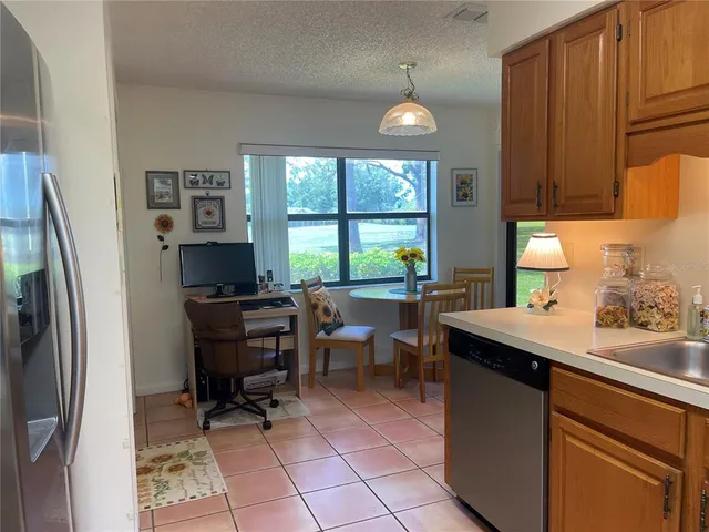 a view of kitchen with breakfast area