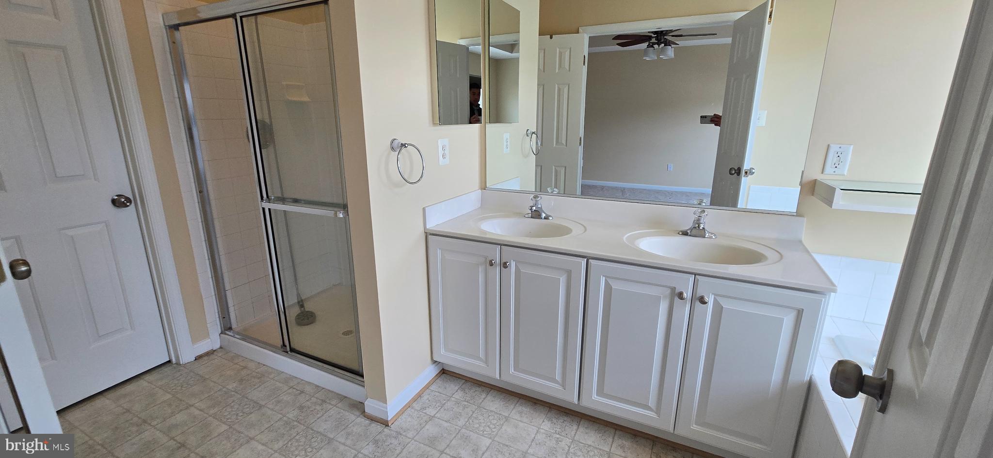 2630 Raptor Drive Odenton, MD 21113 - Photo 21 of 38 a bathroom with a sink and a mirror