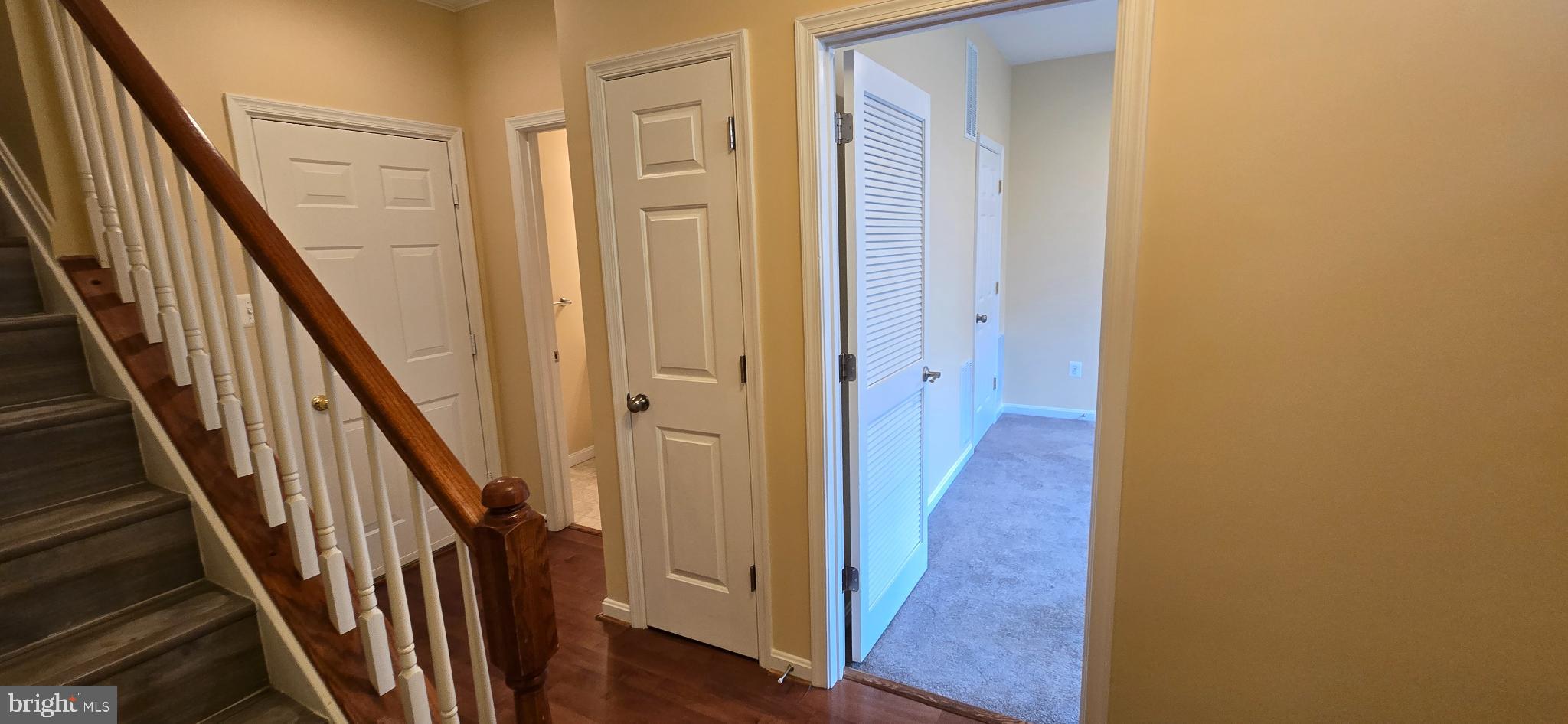 2630 Raptor Drive Odenton, MD 21113 - Photo 32 of 38 a view of a hallway with wooden floor and entryway