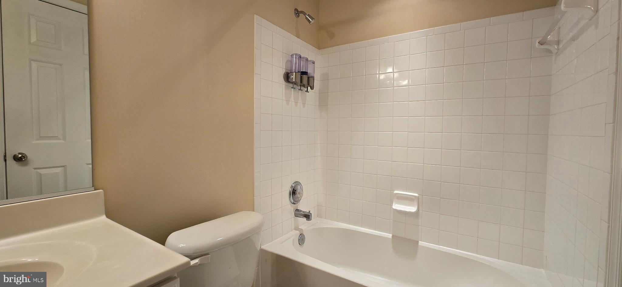 2630 Raptor Drive Odenton, MD 21113 - Photo 34 of 38 a bathroom with a sink and bathtub