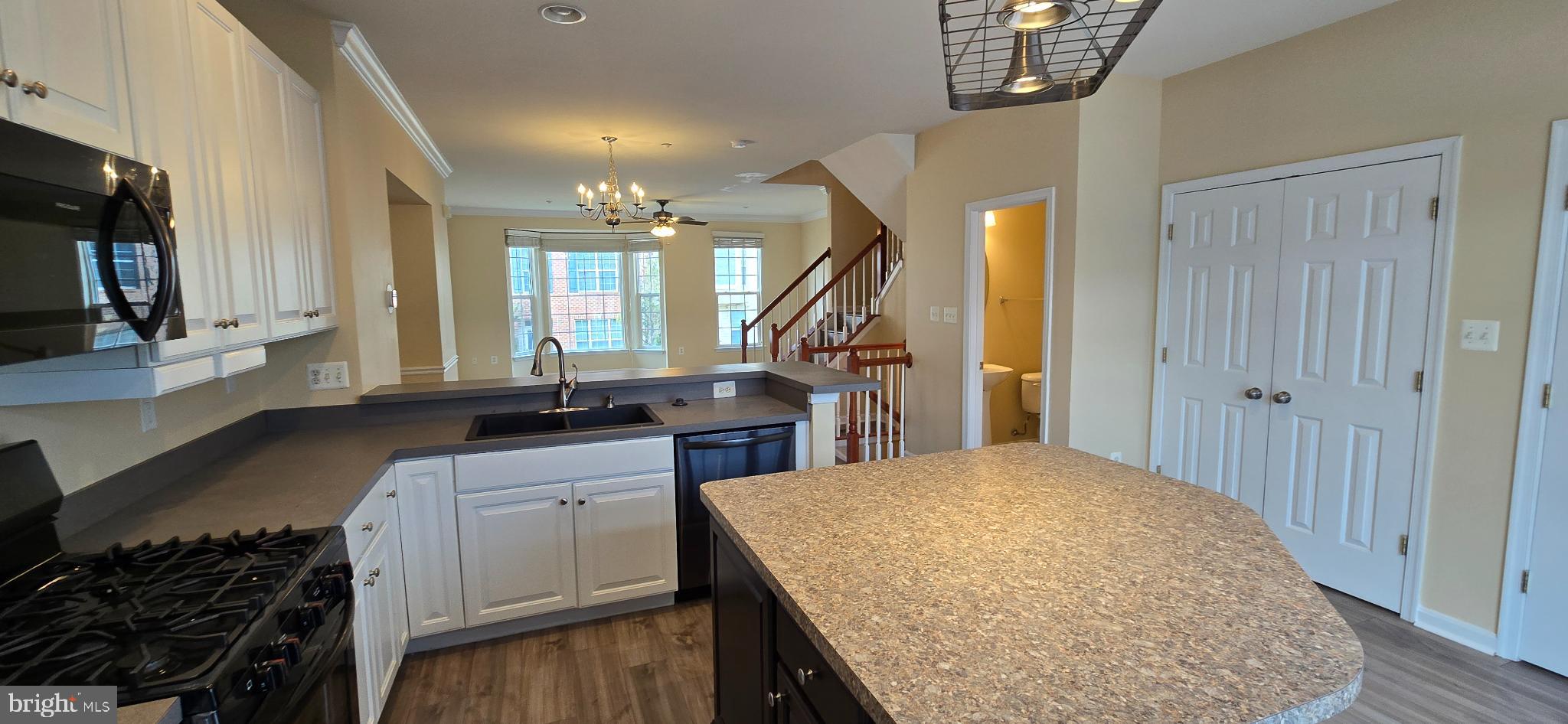 2630 Raptor Drive Odenton, MD 21113 - Photo 10 of 38 a kitchen with a stove a sink and a refrigerator