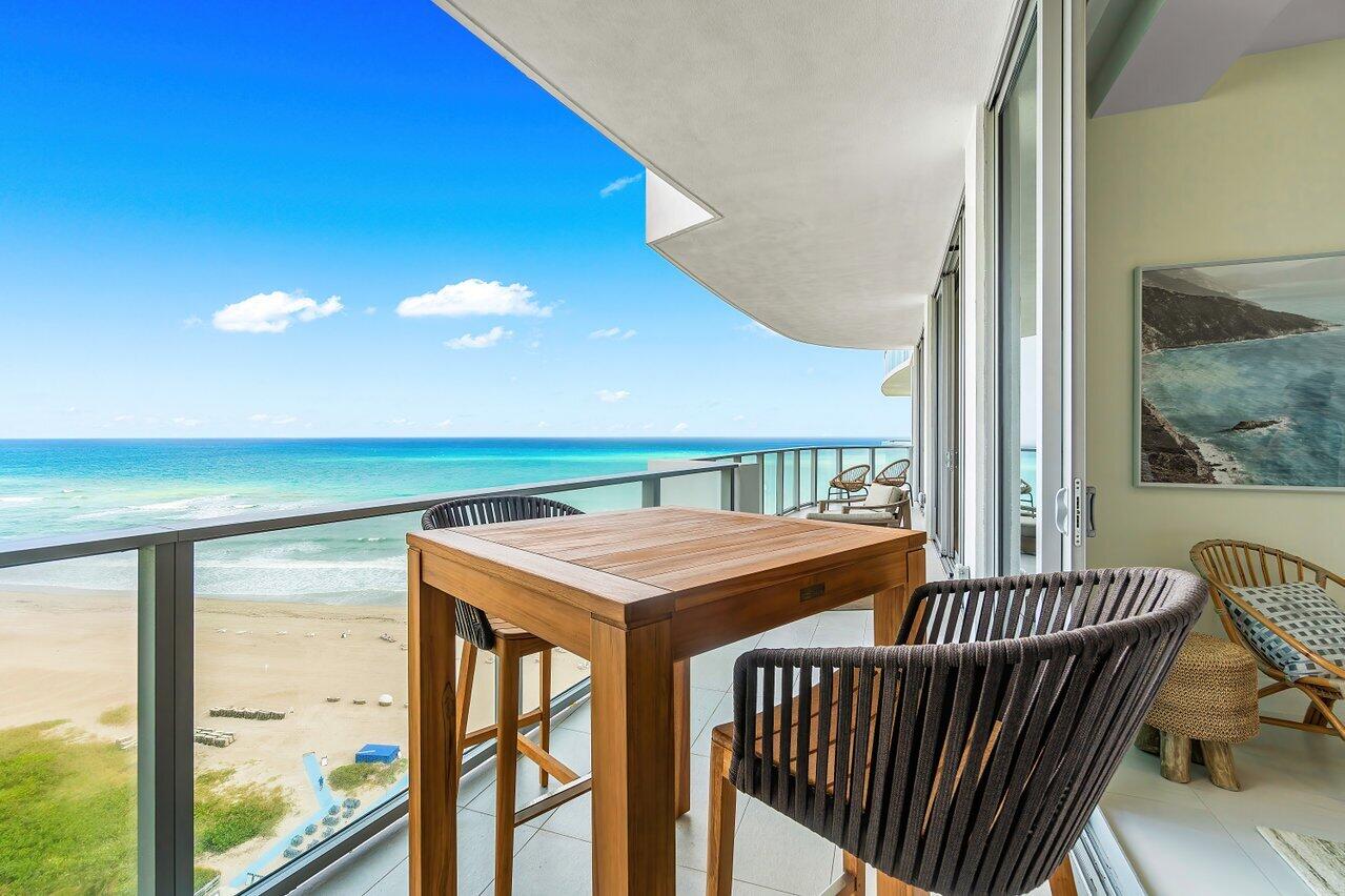 3100 North Ocean Drive, Unit H1602 Singer Island, FL 33404 - Photo 30 of 46 a view of a balcony furniture and floor to ceiling window