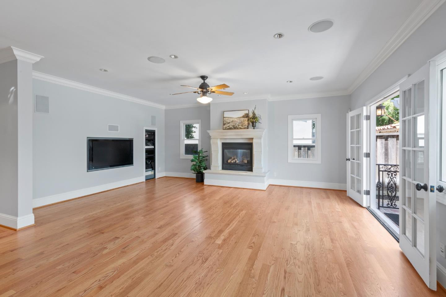 976 Riverside Drive San Jose, CA 95125 - Photo 27 of 78 an empty room with windows fireplace and windows