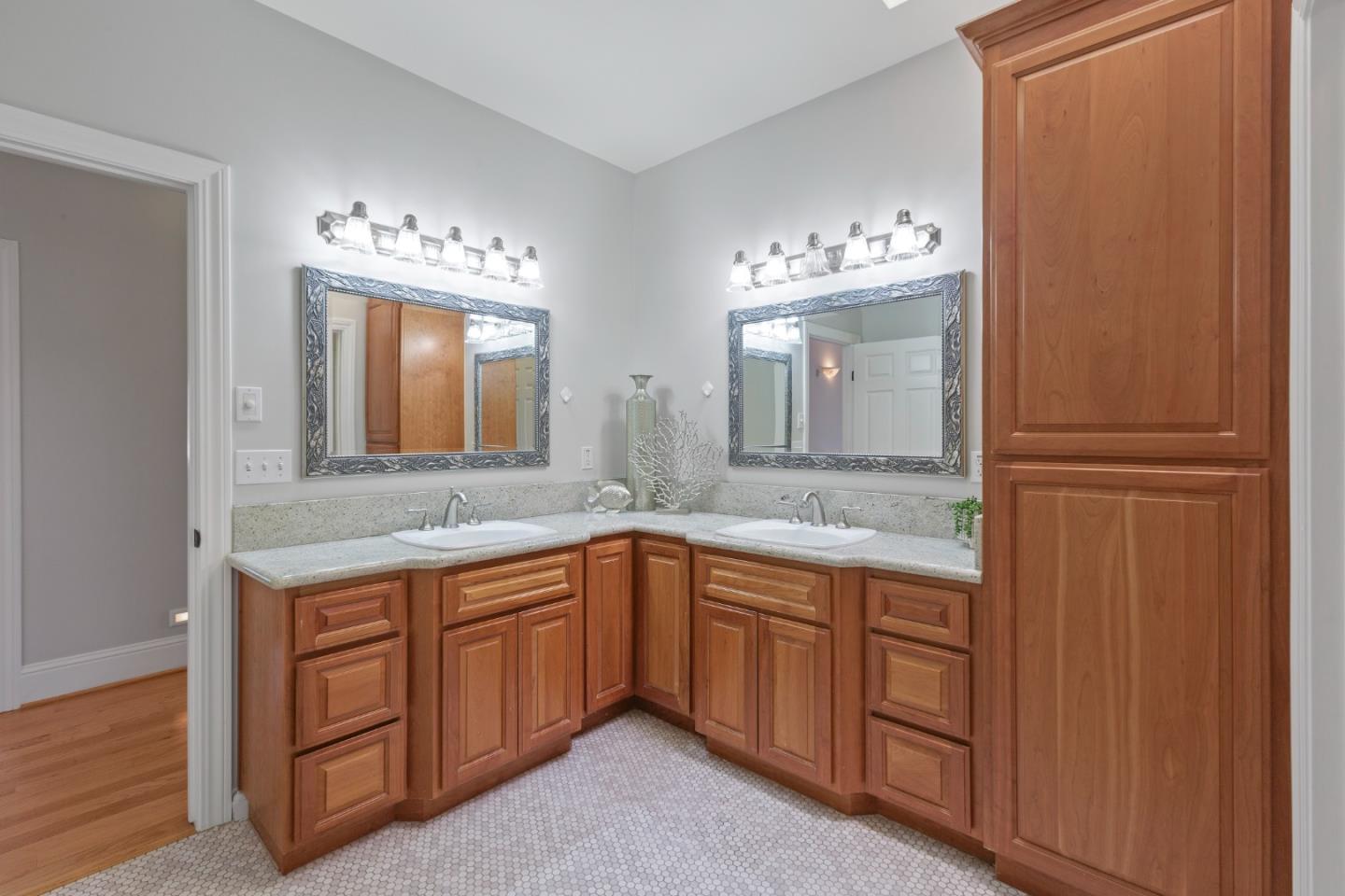 976 Riverside Drive San Jose, CA 95125 - Photo 47 of 78 a bathroom with a double vanity sink and a mirror