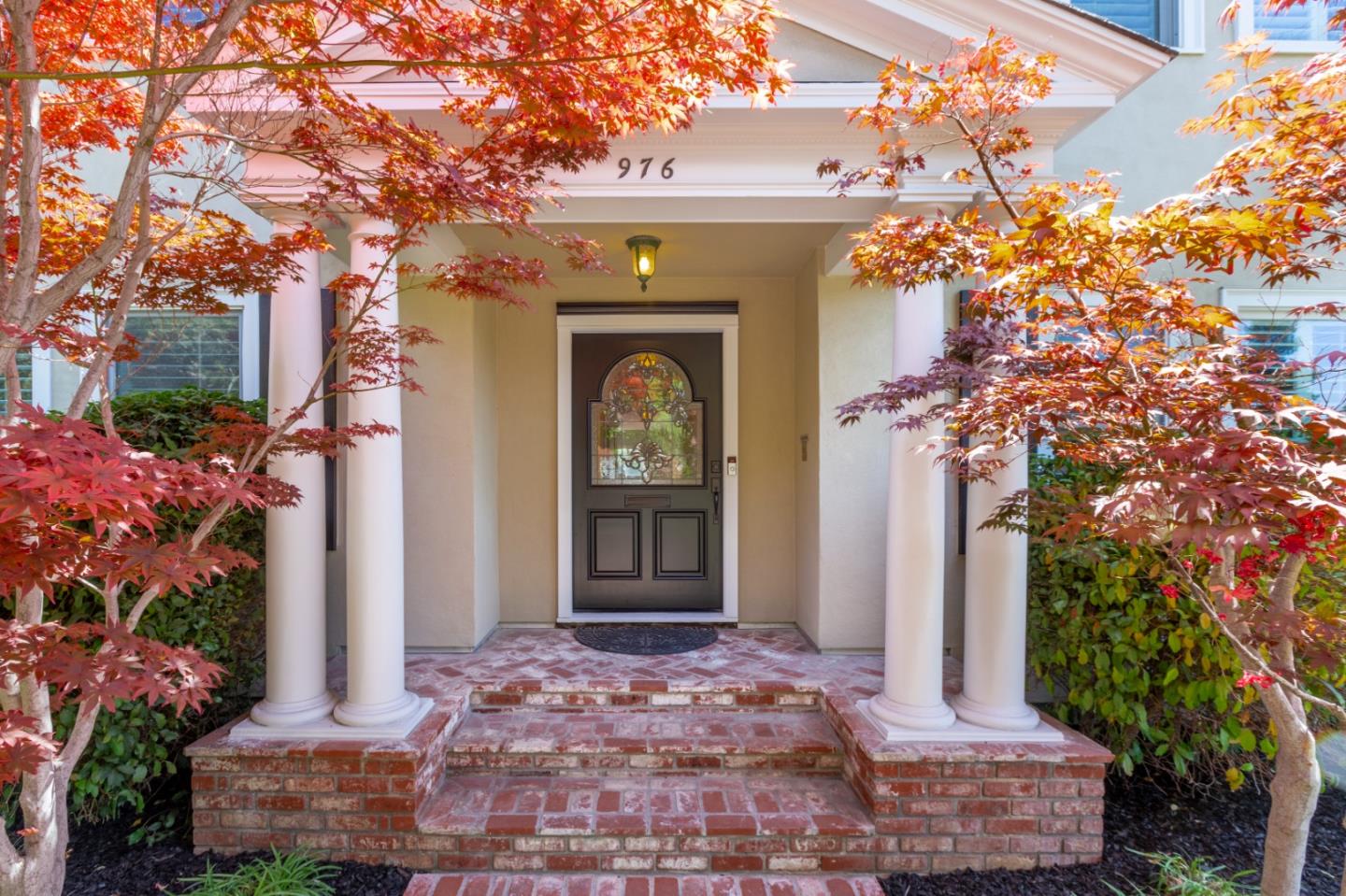 976 Riverside Drive San Jose, CA 95125 - Photo 5 of 78 a front view of a house with a tree
