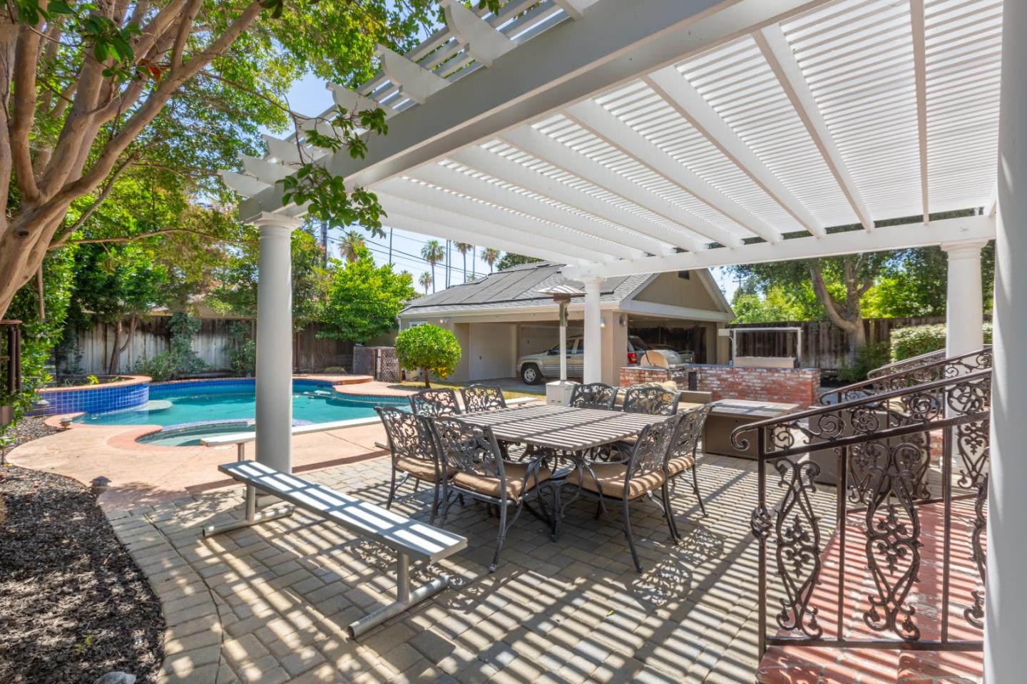 976 Riverside Drive San Jose, CA 95125 - Photo 61 of 78 a view of a patio with table and chairs and floor to ceiling window
