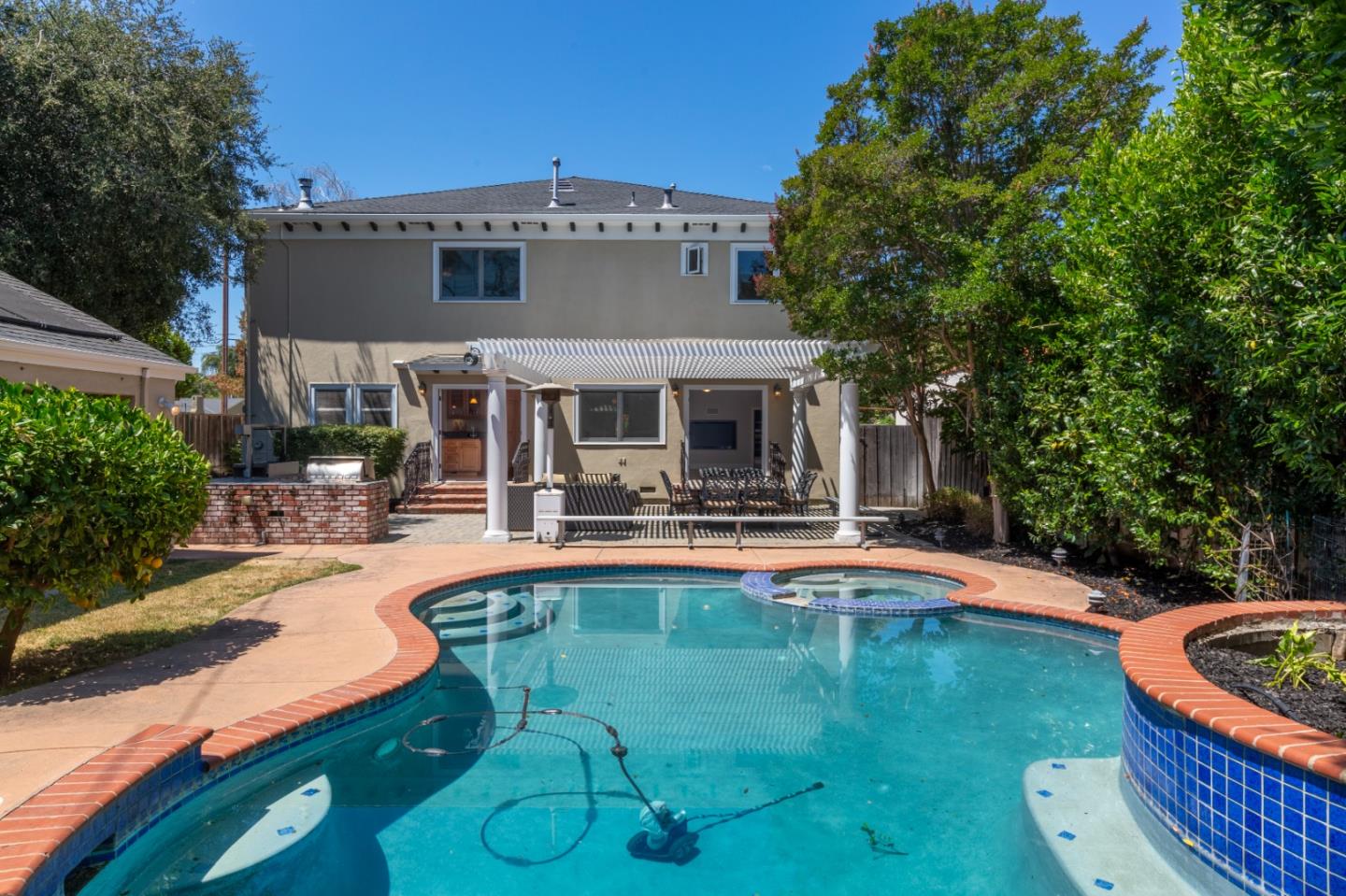 976 Riverside Drive San Jose, CA 95125 - Photo 65 of 78 a view of a house with swimming pool and sitting area
