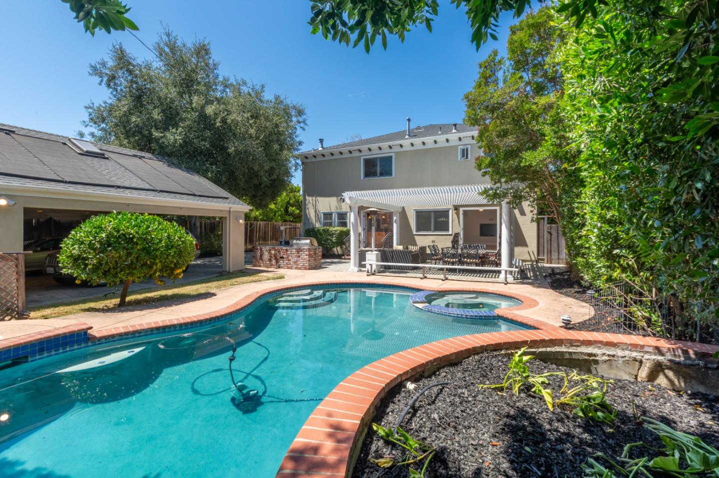 976 Riverside Drive San Jose, CA 95125 - Photo 66 of 78 a view of a house with swimming pool and sitting area