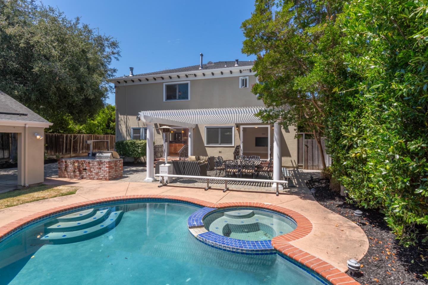 976 Riverside Drive San Jose, CA 95125 - Photo 67 of 78 a swimming pool with outdoor seating and yard