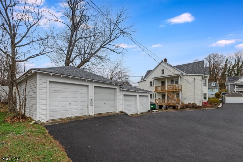 120 High Street, Unit 2 Newton, NJ 07860 - Photo 7 of 7 a view of a white house with a large tree