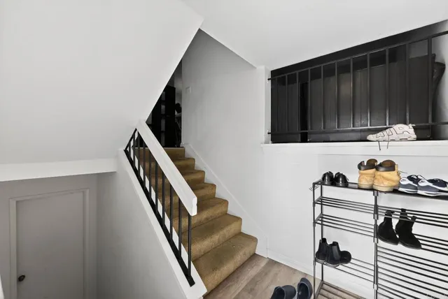 a view of entryway with kitchen