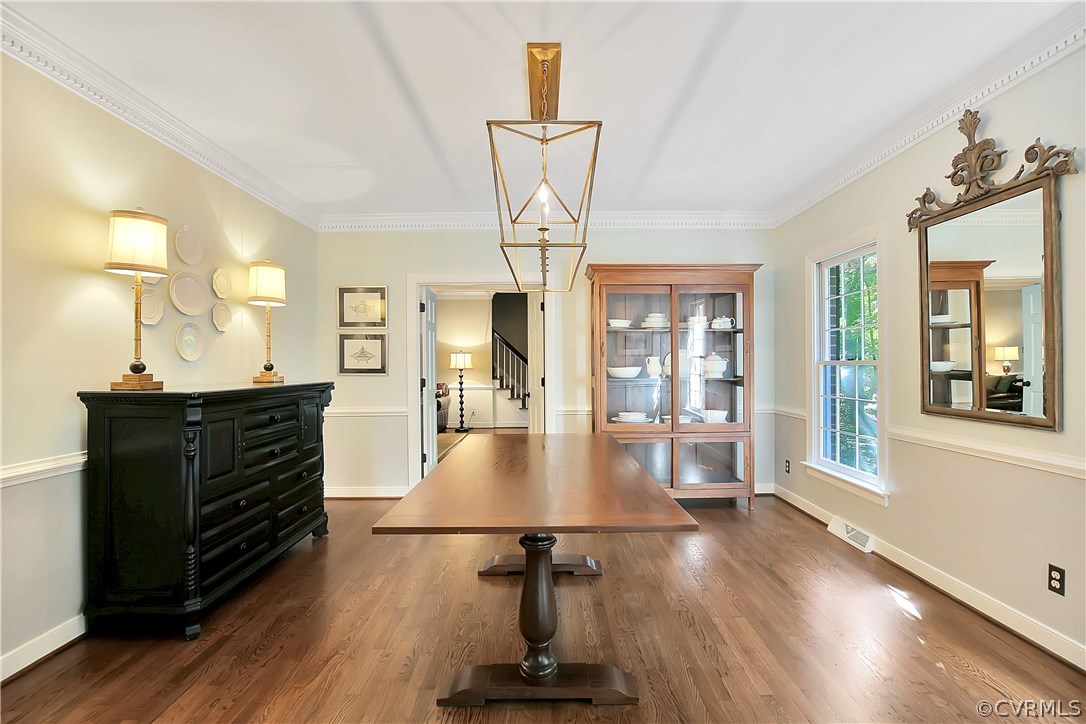 3501 Buckhead Road Midlothian, VA 23113 - Photo 4 of 17 a view of a dining room with furniture wooden floor and a chandelier