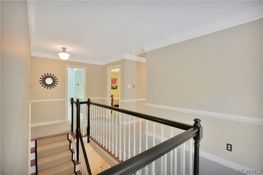 3501 Buckhead Road Midlothian, VA 23113 - Photo 10 of 17 a view of a hallway with wooden floor and staircase