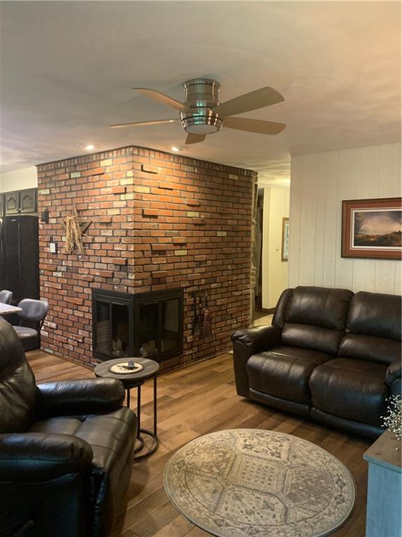 850 Martin Road Indiana, PA 15701 - Photo 8 of 17 a living room with furniture windows and a fireplace