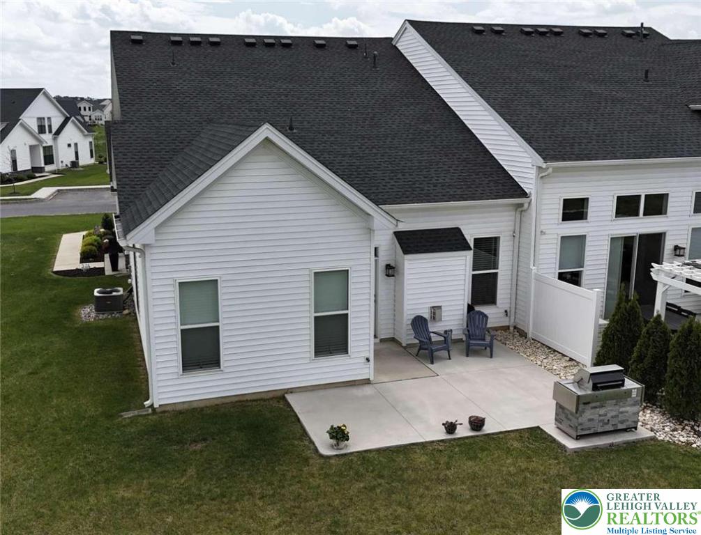 6907 Cedar Drive Bath, PA 18014 - Photo 21 of 23 a view of backyard of house and car parked