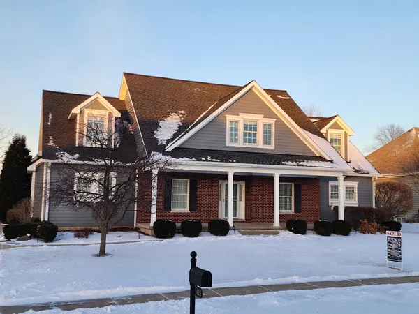 a front view of house with street