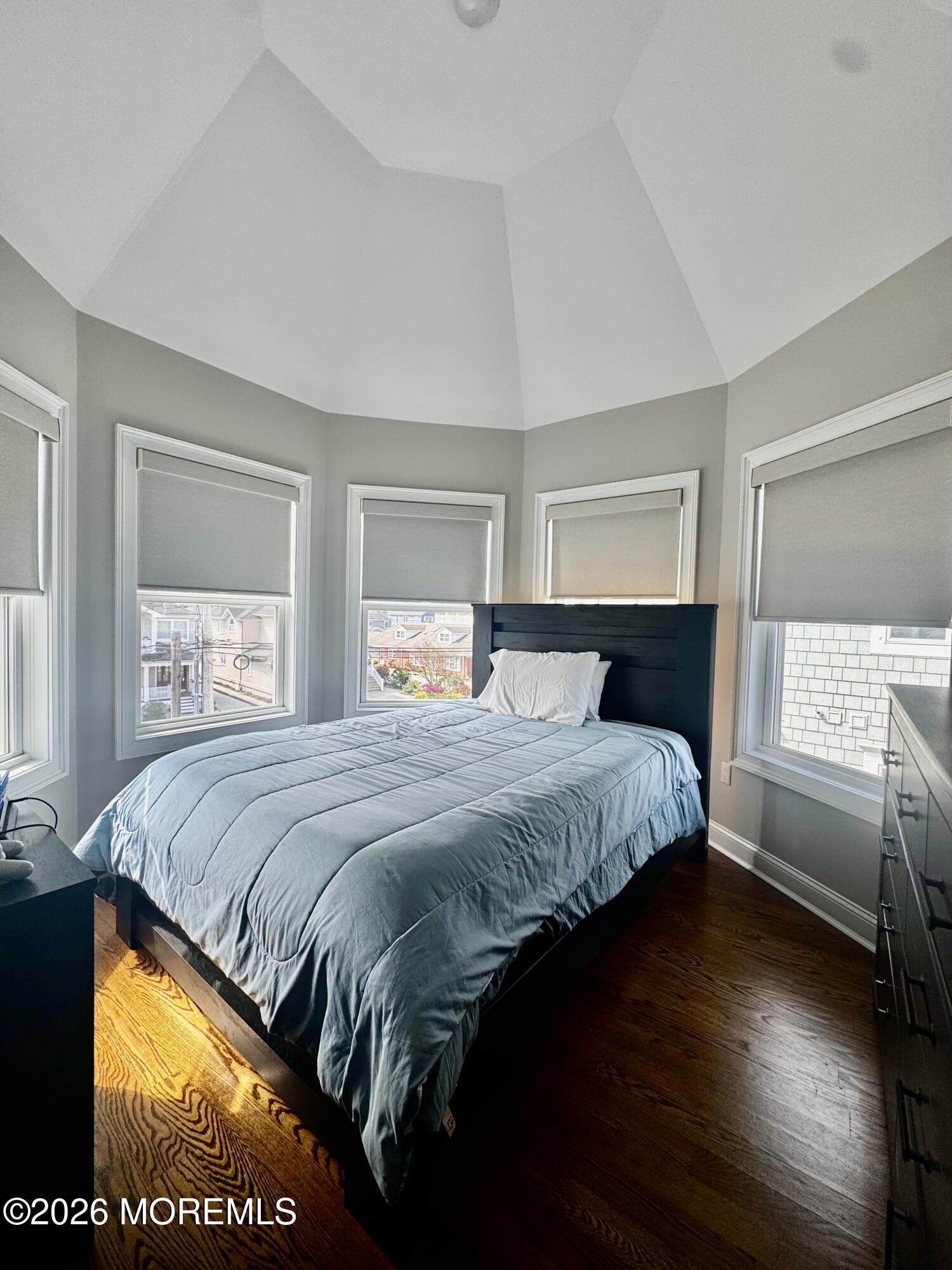 79 Pershing Boulevard Lavallette, NJ 08735 - Photo 8 of 11 a bedroom with a bed and a window