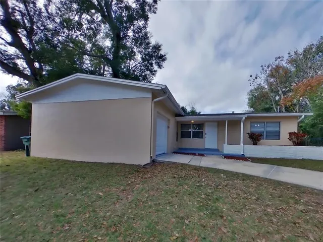 front view of house with a yard