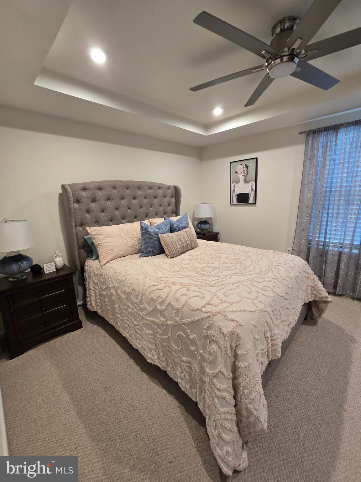 191 Presidents Pointe Avenue Ranson, WV 25438 - Photo 22 of 36 Serene bedroom with elegant design elements.