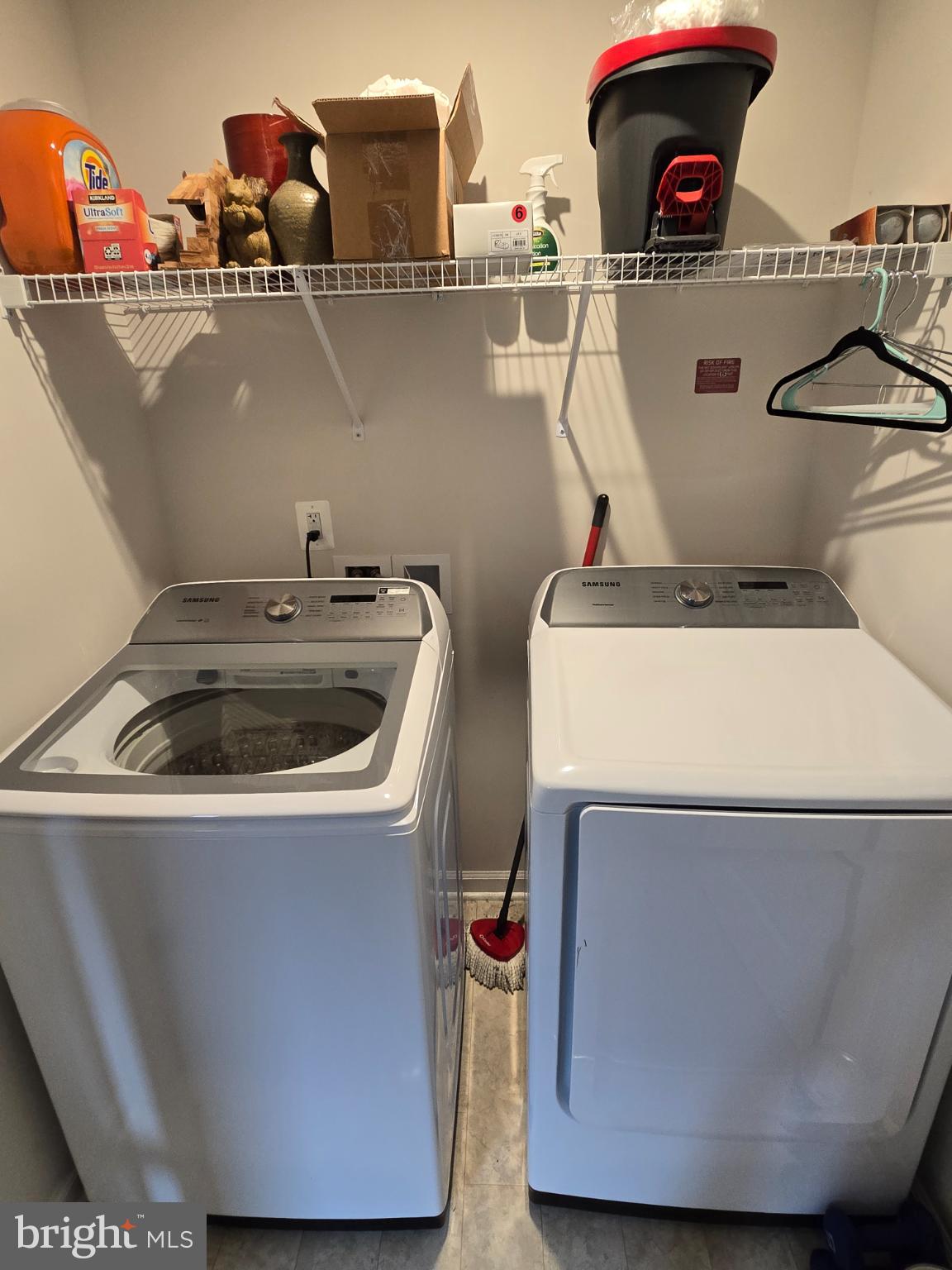 191 Presidents Pointe Avenue Ranson, WV 25438 - Photo 4 of 36 Modern laundry space with ample storage.