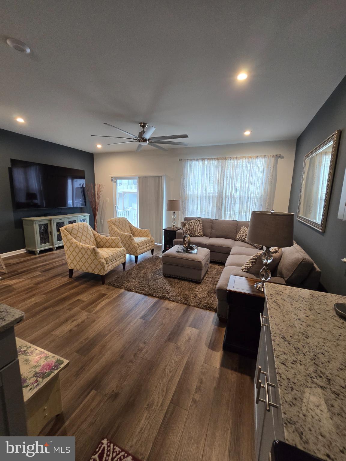 191 Presidents Pointe Avenue Ranson, WV 25438 - Photo 6 of 36 Modern living space with warm, inviting tones.