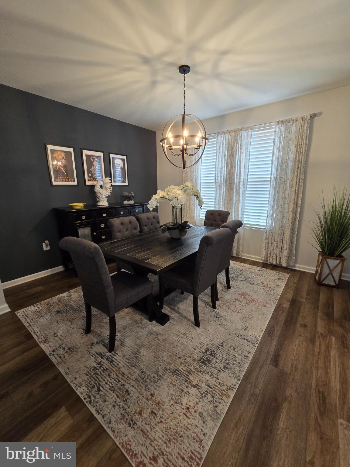 191 Presidents Pointe Avenue Ranson, WV 25438 - Photo 7 of 36 Elegant dining space with modern accents.