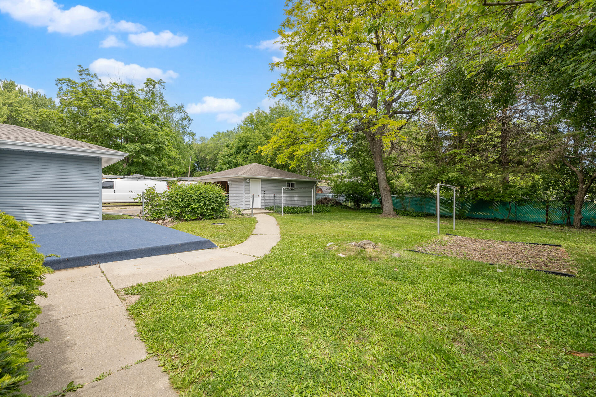513 Bender Road, Unit 515 West Bend, WI 53090 - Photo 4 of 29 BACKSIDE