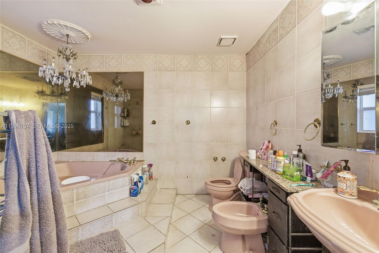 401 Southwest 28th Road Miami, FL 33129 - Photo 19 of 45 a bathroom with a sink a toilet and shower