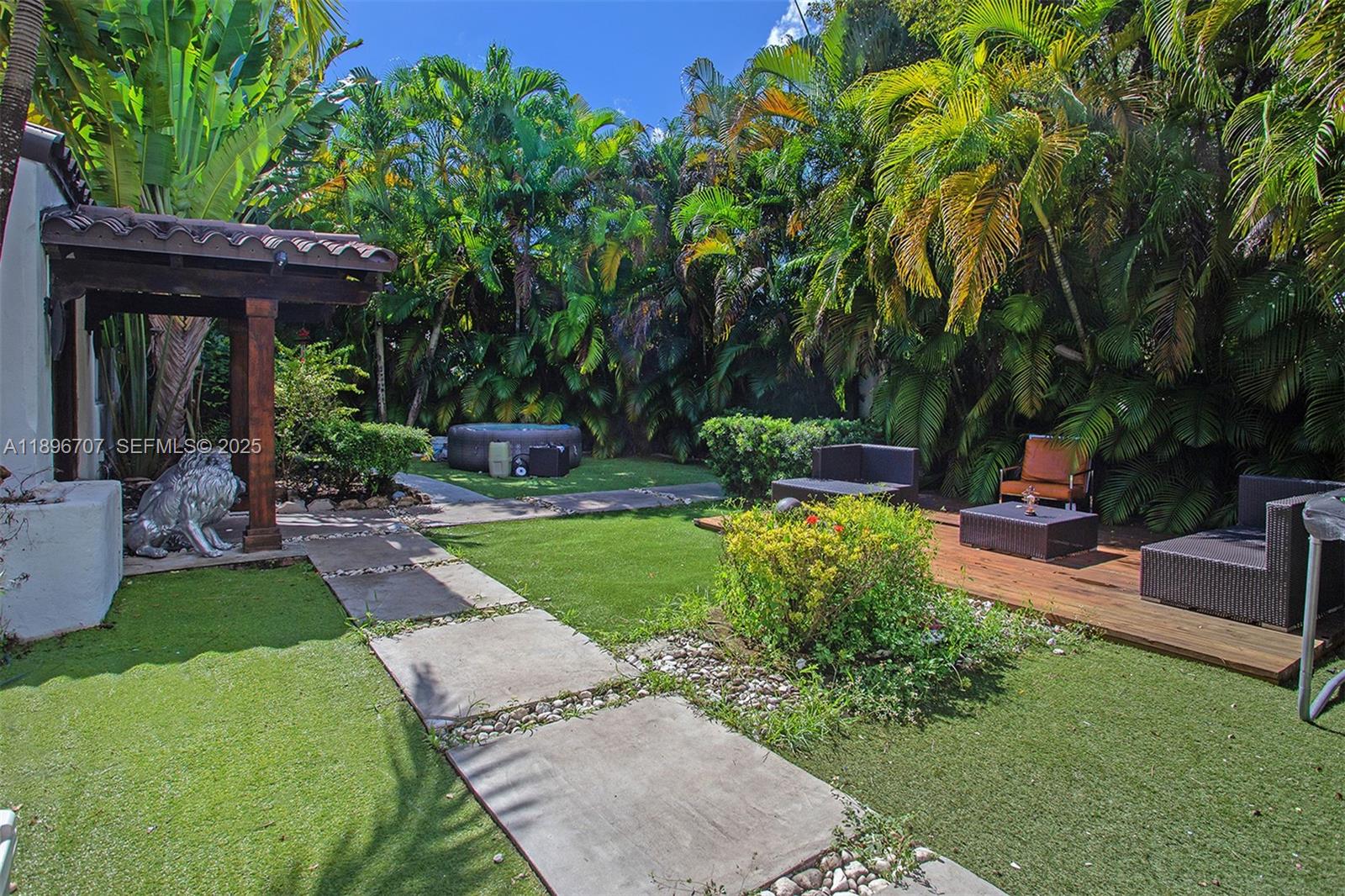 401 Southwest 28th Road Miami, FL 33129 - Photo 26 of 45 a view of a backyard with sitting area