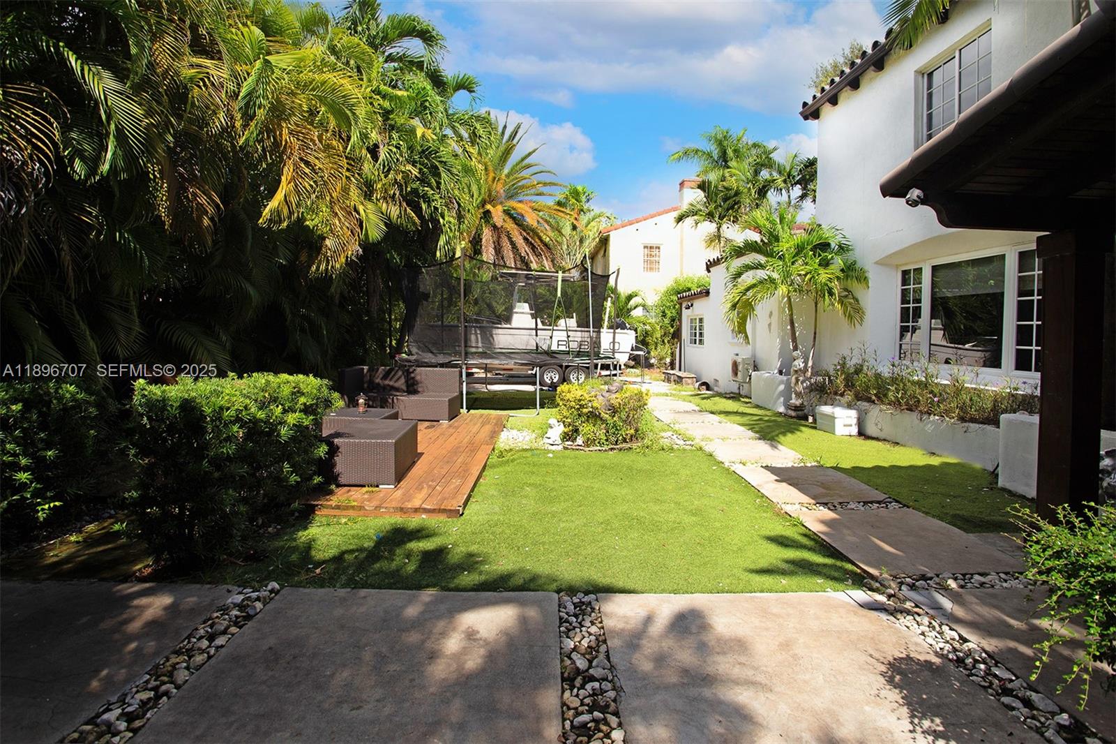 401 Southwest 28th Road Miami, FL 33129 - Photo 27 of 45 a view of a backyard with swimming pool