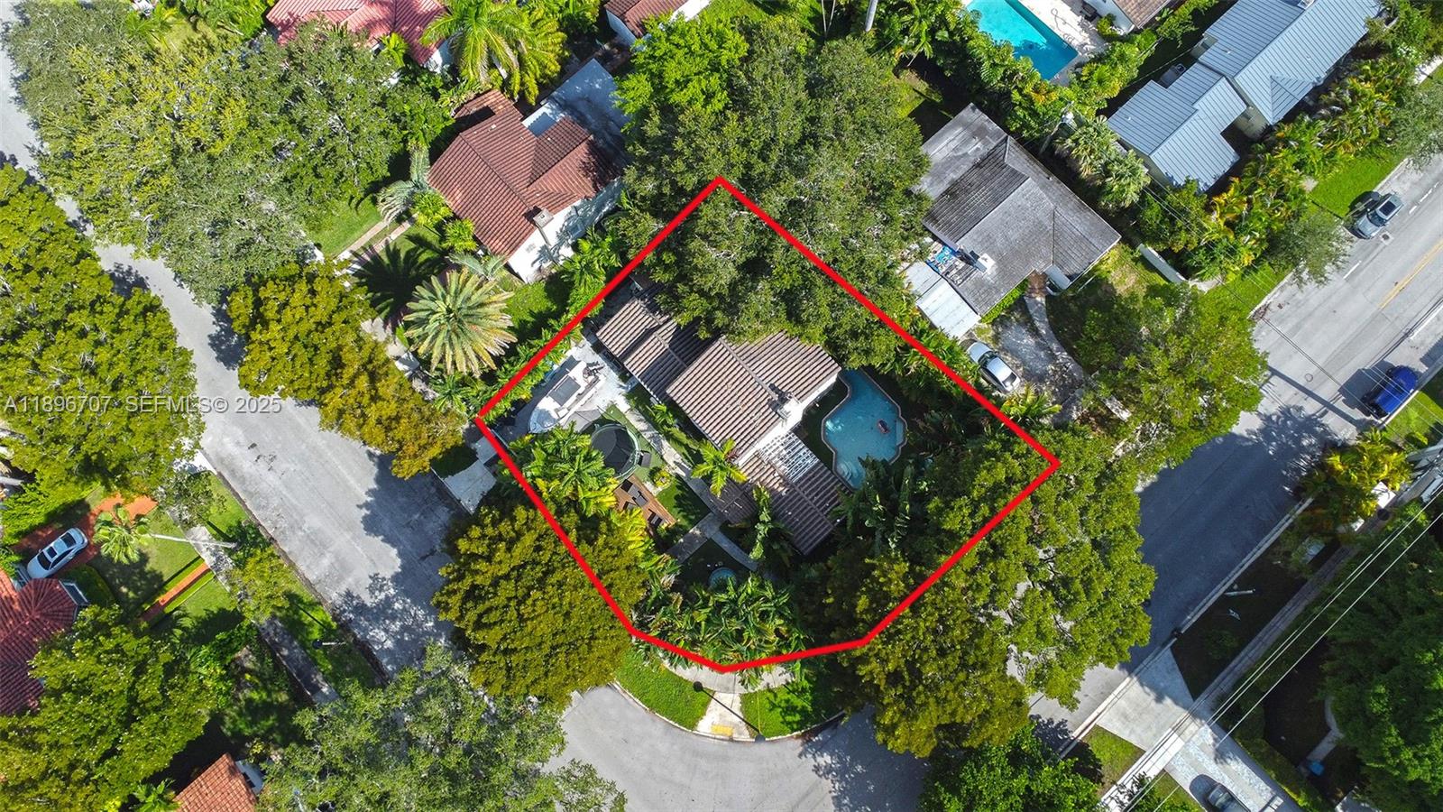 401 Southwest 28th Road Miami, FL 33129 - Photo 31 of 45 an aerial view of residential house with outdoor space and trees all around