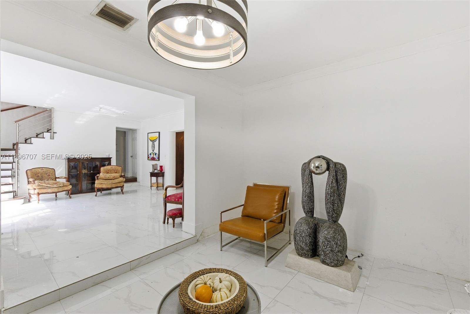 401 Southwest 28th Road Miami, FL 33129 - Photo 8 of 45 a view of living room and kitchen with furniture