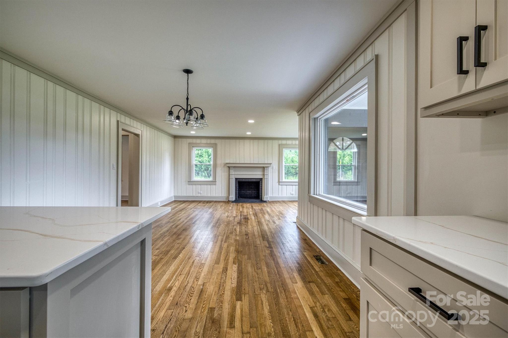 2775 Snipes Street Morganton, NC 28655 - Photo 4 of 28 a living room with furniture and a fireplace