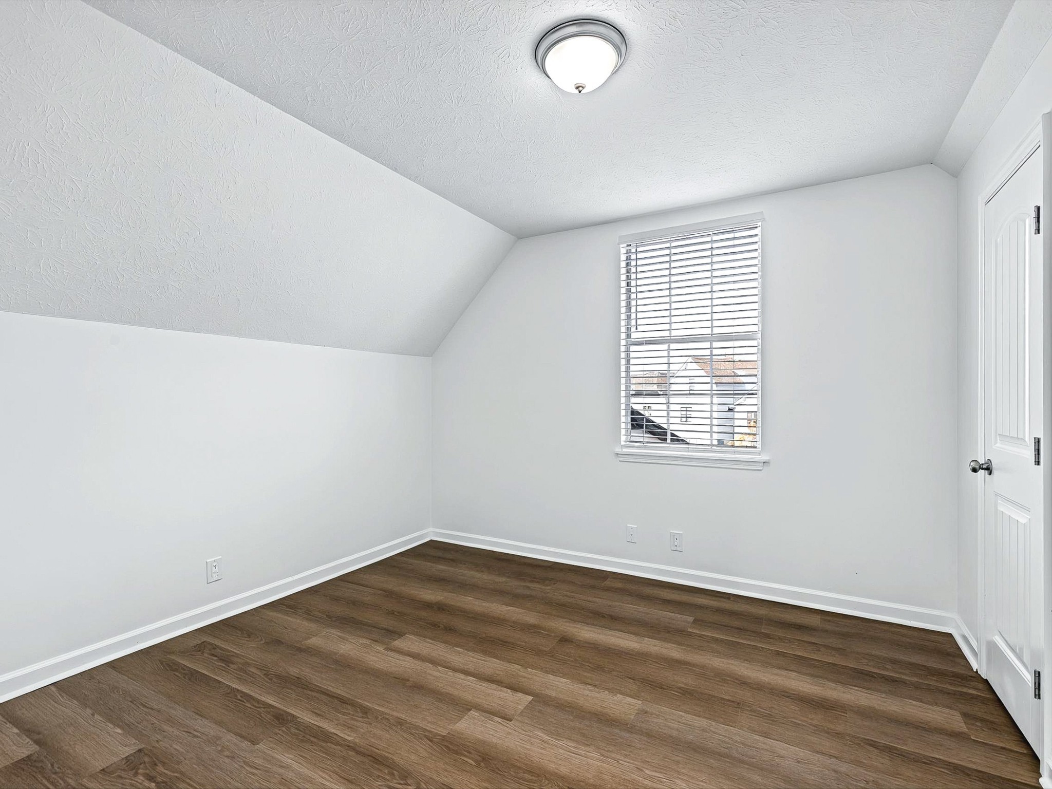 2688 Pine Ridge Drive Nashville, TN 37207 - Photo 23 of 39 an empty room with wooden floor and windows