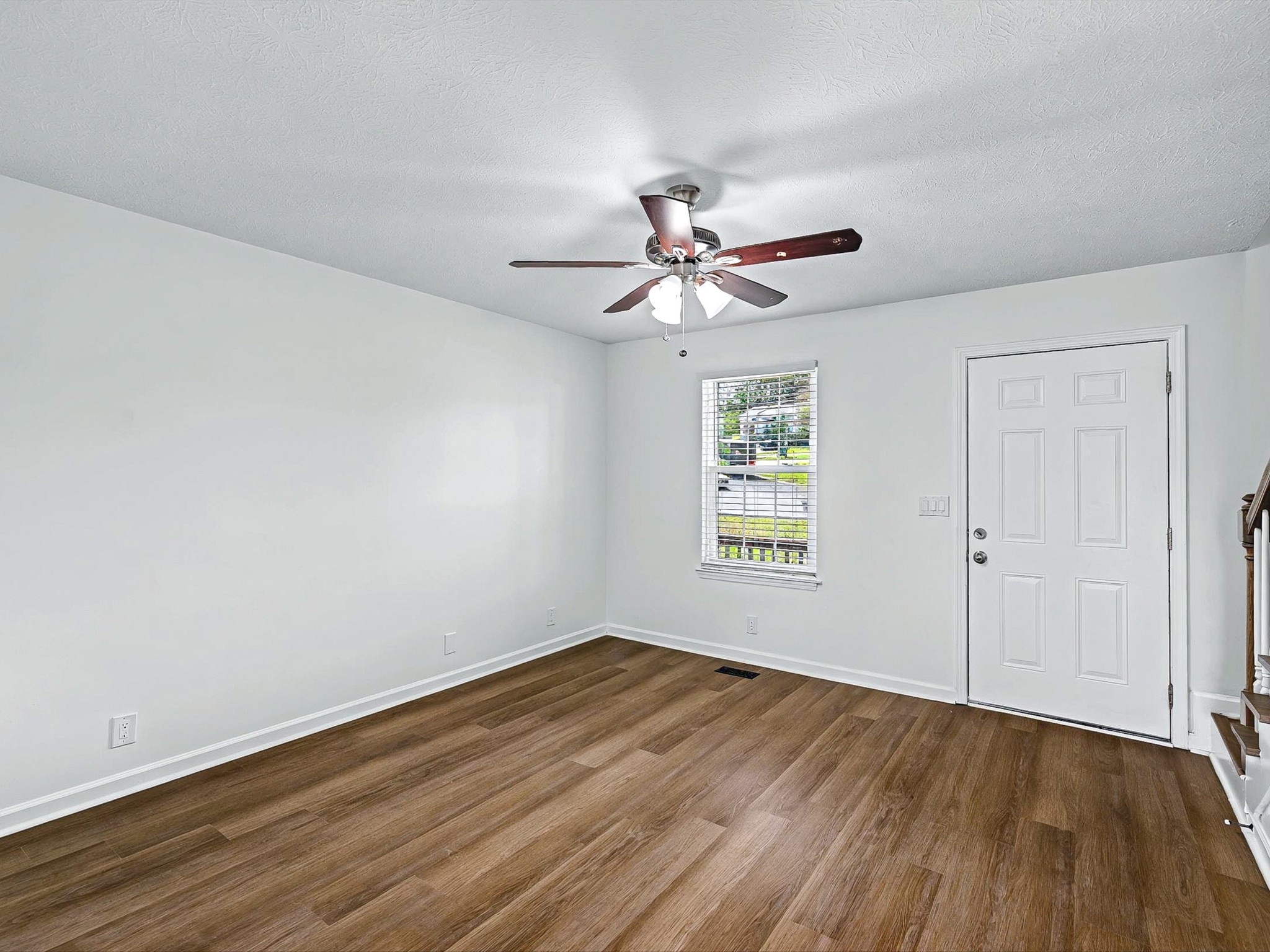 2688 Pine Ridge Drive Nashville, TN 37207 - Photo 6 of 39 an empty room with wooden floor and windows