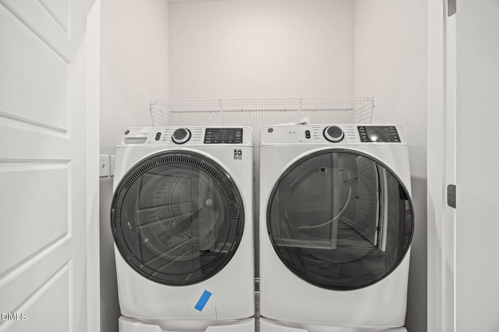 501 Hedrick Ridge Road Cary, NC 27519 - Photo 33 of 47 a utility room with dryer and washer