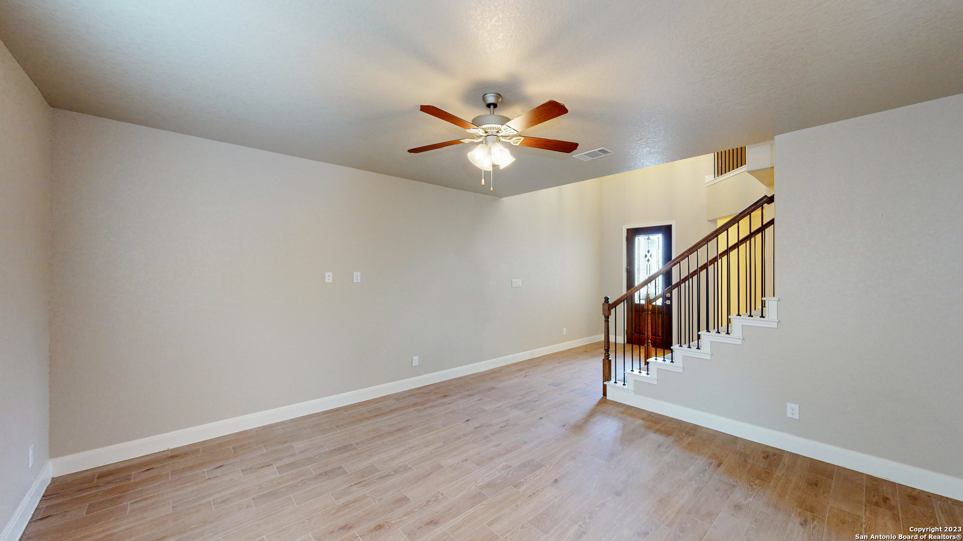 146 Magnolia Circle Boerne, TX 78006 - Photo 17 of 20 a view of an empty room with wooden floor
