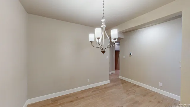 a view of a chandelier in a room