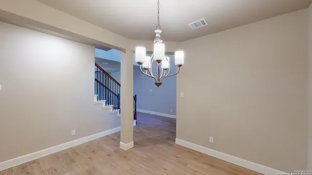 a view of a hallway with entryway