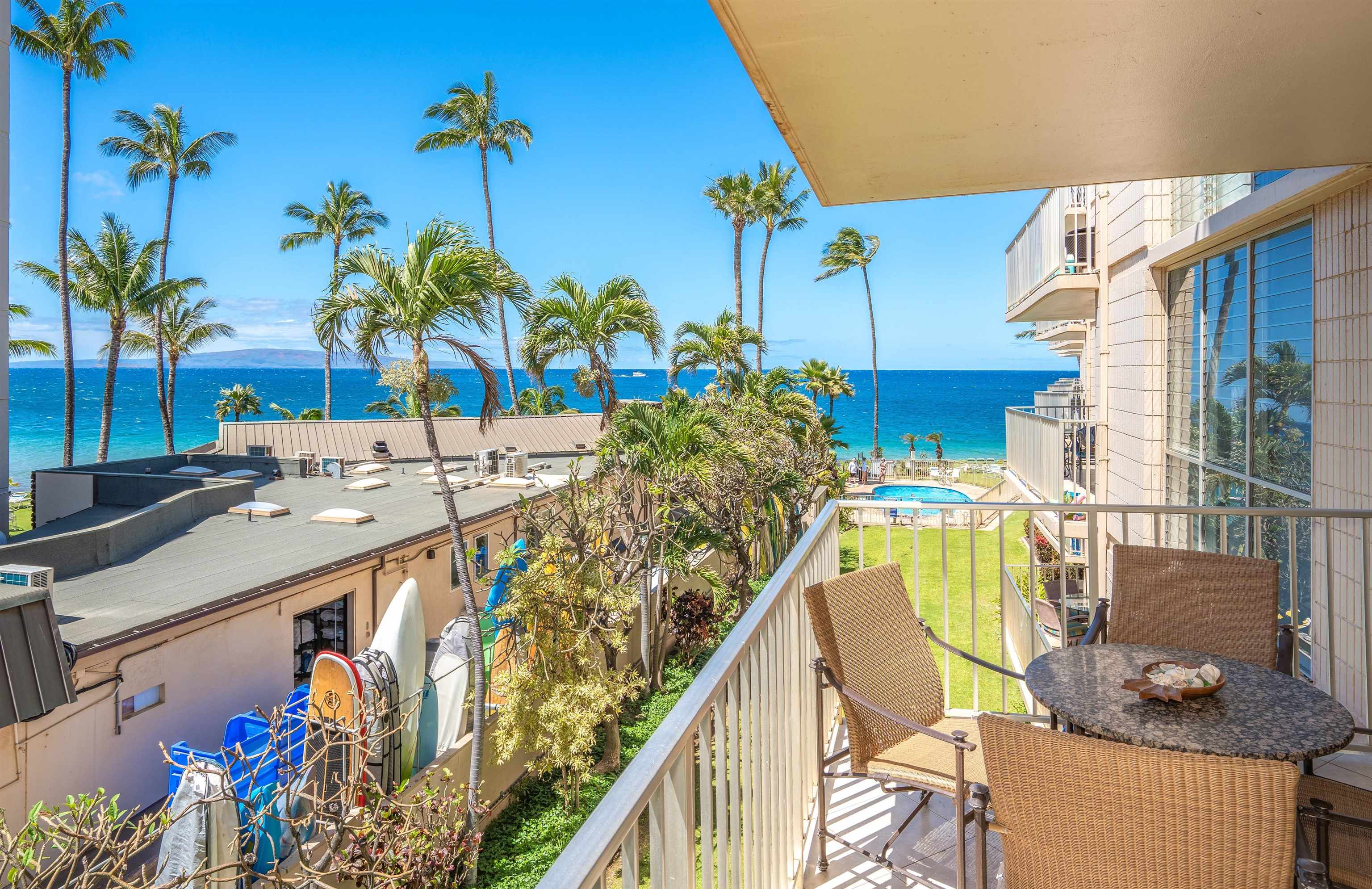2450 South Kihei Road, Unit 301 Kihei, HI 96753 - Photo 2 of 35 a view of a house with a swimming pool