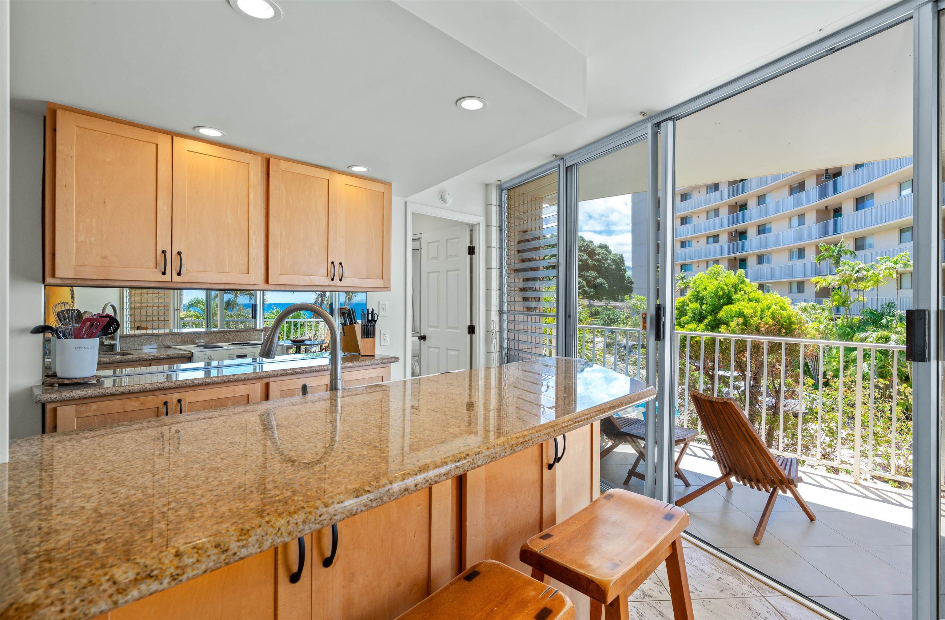 2450 South Kihei Road, Unit 301 Kihei, HI 96753 - Photo 8 of 35 a view of a living room and floor to ceiling window or wooden floor